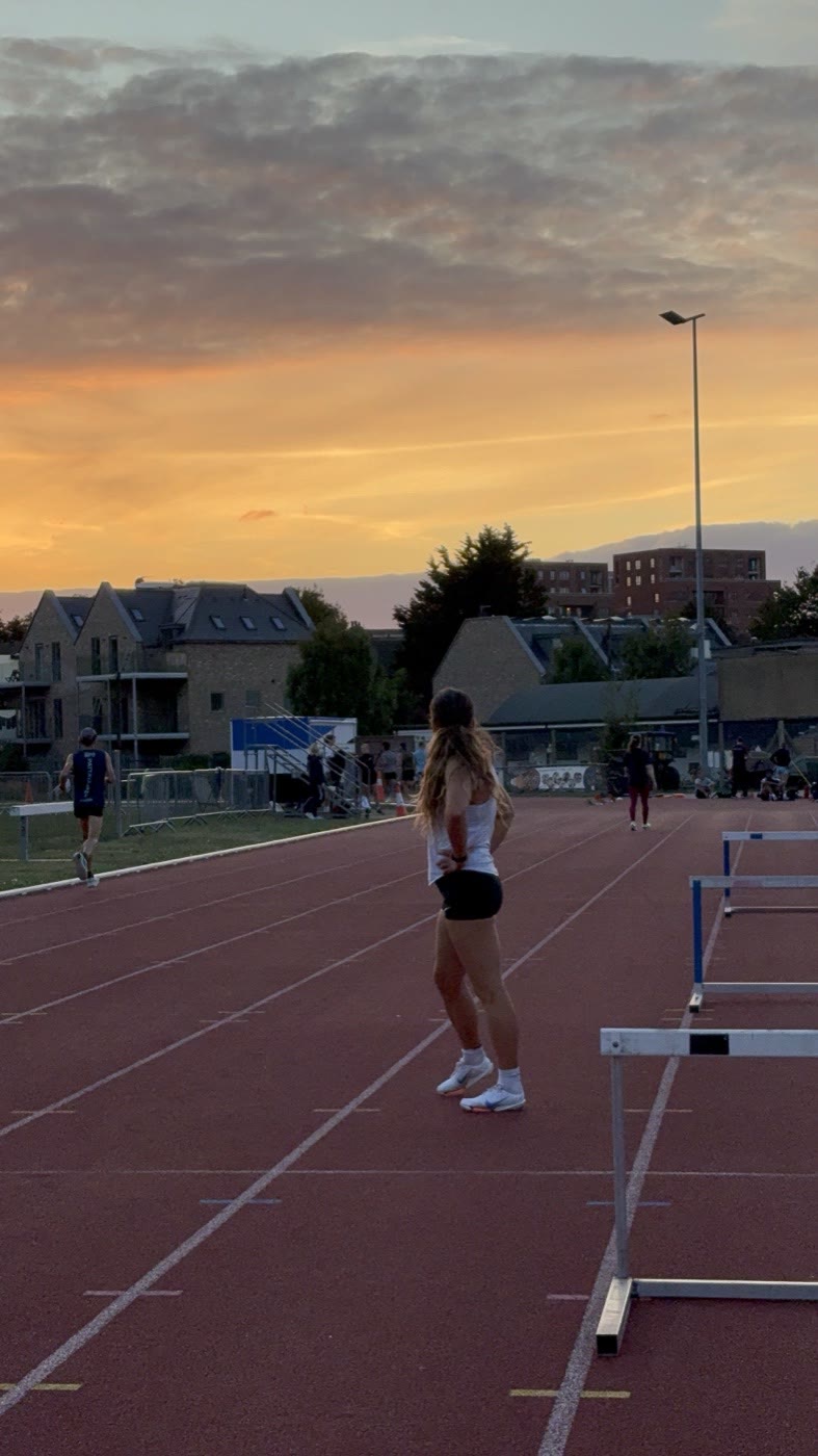 Pippa Earley on the track at golden hour